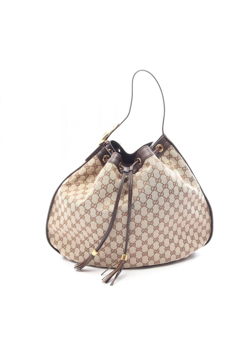 Gucci Gg Canvas Drawstring Shoulder Bag #360194G95B